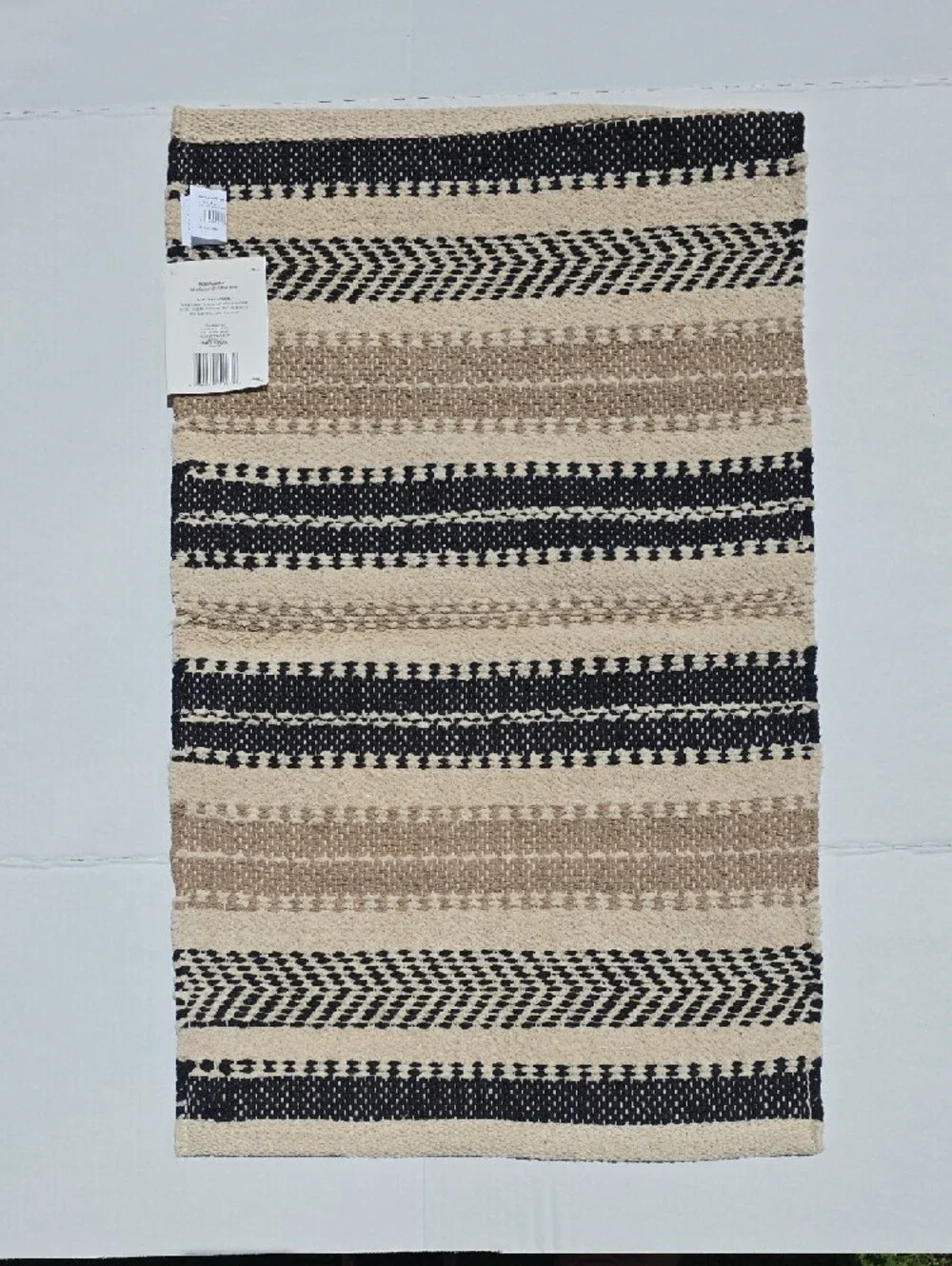 Home Collection woven scatter neutral